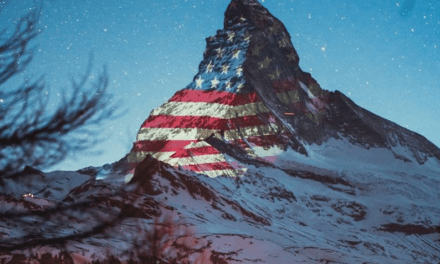 Swiss Village Projecting World Flags Onto Mountaintop In Pandemic Solidarity